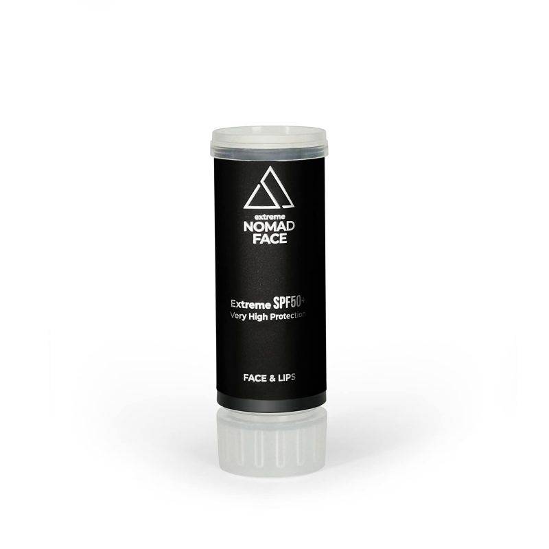 stick spf50+ mejor-proteccion-solar-facial Un tubo blanco y negro de protector solar nómada extremo spf50+ etiquetado para cara y labios, aislado sobre un fondo blanco.